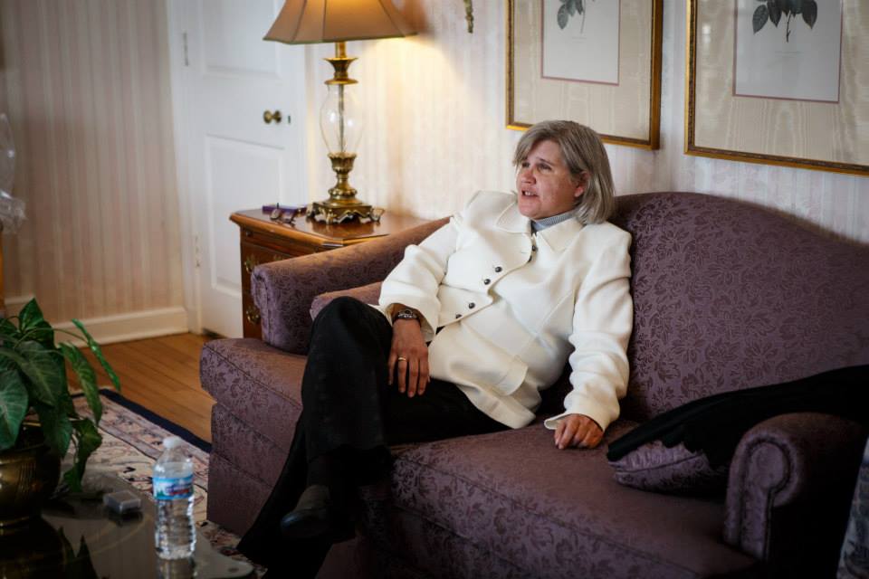 image of Sue Cline sitting on a sofa
