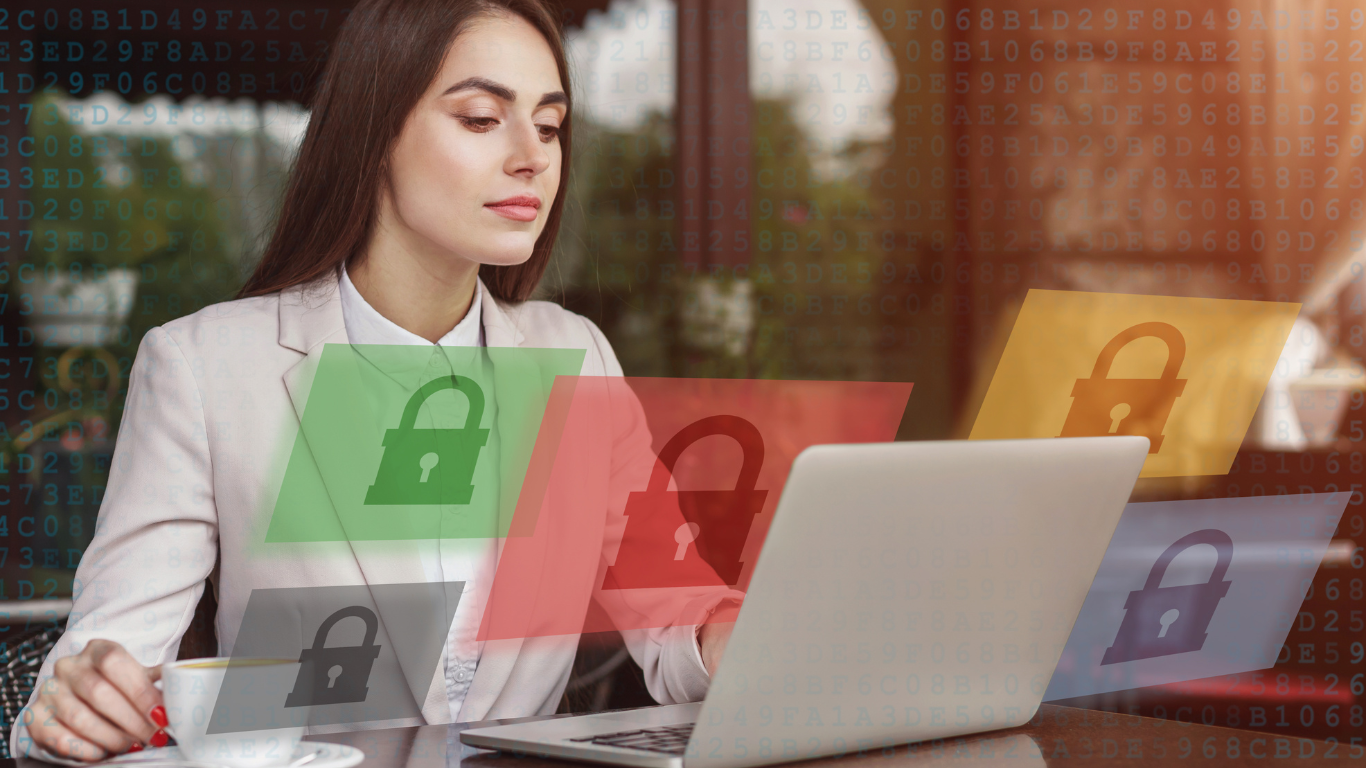 image of a woman using a computer with green and red shields in front of the screen with lock symbols on them