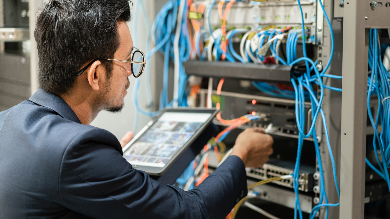 image shows a man working on a simple network